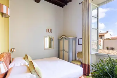 Letto o letti in una camera di Residenza Della Signoria