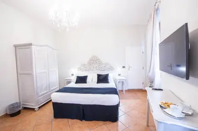 Letto o letti in una camera di Residenza Florentia
