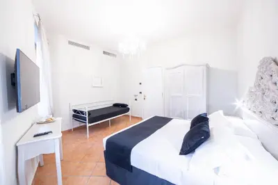 Letto o letti in una camera di Residenza Florentia