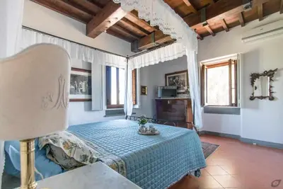 Letto o letti in una camera di VILLA PRIVATA CON PISCINA FIRENZE CHIANTI