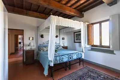 Letto o letti in una camera di VILLA PRIVATA CON PISCINA FIRENZE CHIANTI