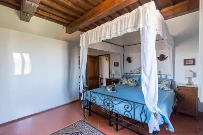 Letto o letti in una camera di VILLA PRIVATA CON PISCINA FIRENZE CHIANTI
