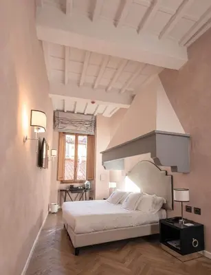 Letto o letti in una camera di Relais Uffizi