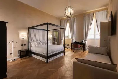 Letto o letti in una camera di Relais Uffizi