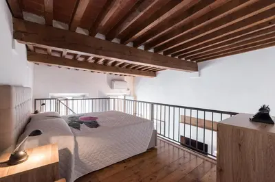 Letto o letti in una camera di Firenze Rentals Suite Proconsolo
