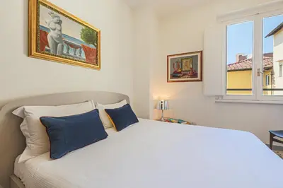 Letto o letti in una camera di Apartments Florence - Santa Maria Balcony