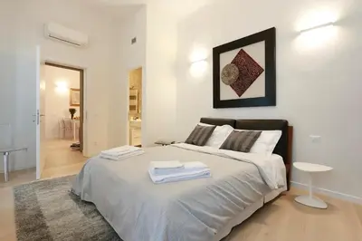 Letto o letti in una camera di Opera 19 Luxury Apartment
