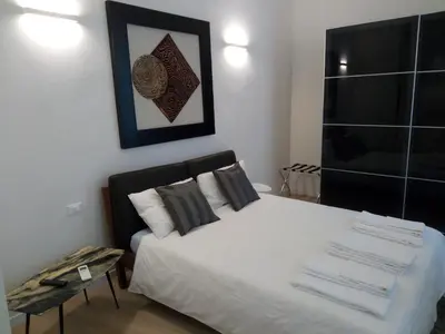 Letto o letti in una camera di Opera 19 Luxury Apartment