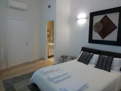 Letto o letti in una camera di Opera 19 Luxury Apartment