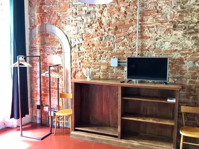 TV o dispositivi per l'intrattenimento presso Velvet Loft - Santo Spirito Apartment