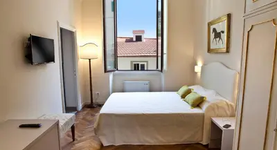 Letto o letti in una camera di Il Dromedario