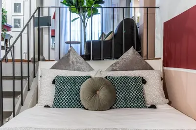Letto o letti in una camera di Wine Apartments Florence Vernaccia