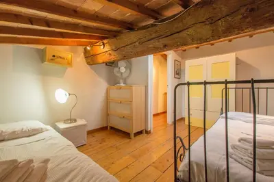 Letto o letti in una camera di Appartamento Bellavista Firenze