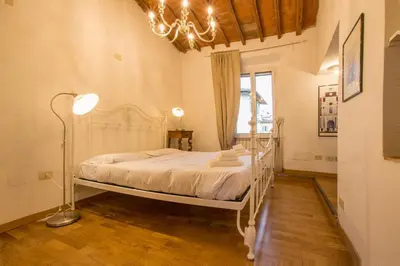 Letto o letti in una camera di Appartamento Bellavista Firenze