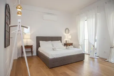 Letto o letti in una camera di Love The Stylish Lift in Ponte Vecchio - Love The Apartments
