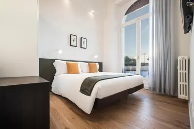 Letto o letti in una camera di 7Florence