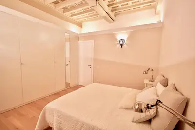 Letto o letti in una camera di Carmine Apartment