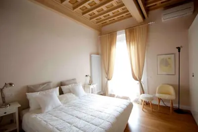 Letto o letti in una camera di Carmine Apartment