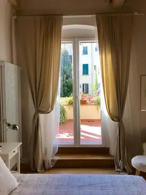 Letto o letti in una camera di Carmine Apartment