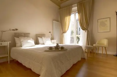 Letto o letti in una camera di Carmine Apartment