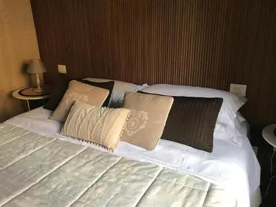 Letto o letti in una camera di Piazza Signoria Suite