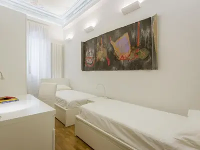 Letto o letti in una camera di Apartments Florence - Duomo Art