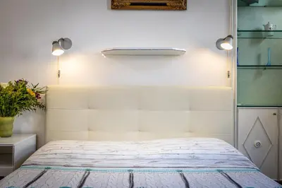 Letto o letti in una camera di Duomo Palace