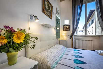 Letto o letti in una camera di Duomo Palace