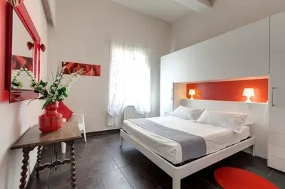 Letto o letti in una camera di Glam Apartments