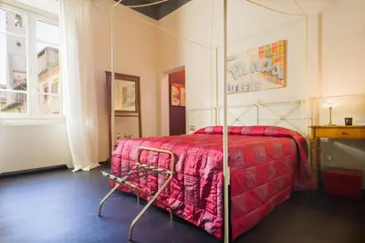 Letto o letti in una camera di Arnobio Florence Suites
