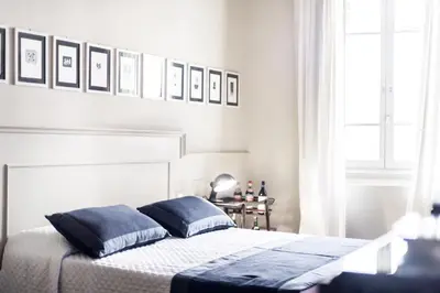 Letto o letti in una camera di Arnobio Florence Suites