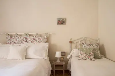 Letto o letti in una camera di Casa Laura