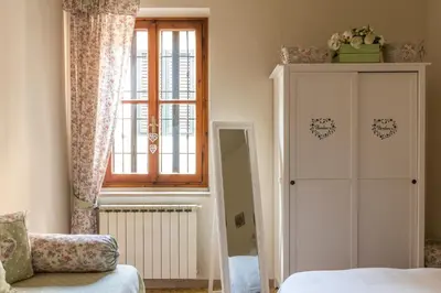 Letto o letti in una camera di Casa Laura