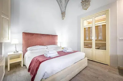 Letto o letti in una camera di Residenza d'Epoca Palazzo Riblet