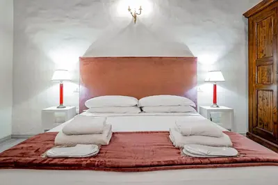 Letto o letti in una camera di Residenza d'Epoca Palazzo Riblet