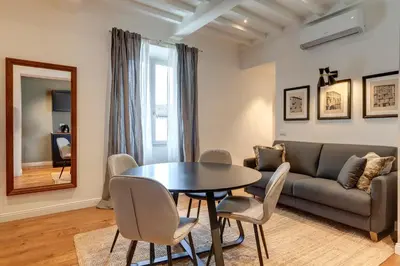 Area soggiorno di La Badessa Apartment by Mamo Florence