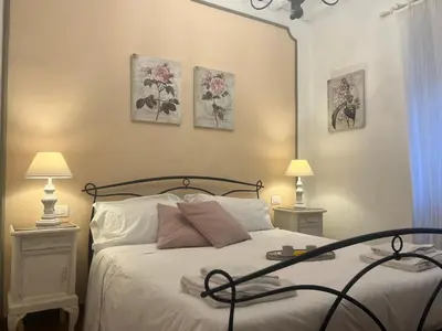 Letto o letti in una camera di Belvedere Suite Florence
