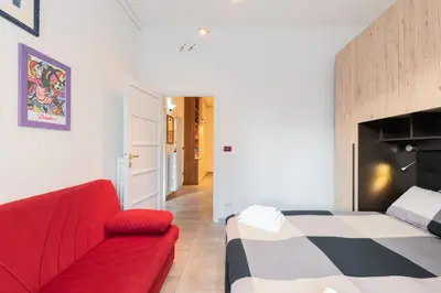 Letto o letti in una camera di Cappuccini Florence Spacious 3BR Family Apartment, Fast Tram