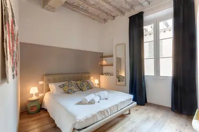 Letto o letti in una camera di Boheme Apartment by Mamo Florence