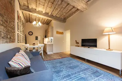 TV o dispositivi per l'intrattenimento presso Boheme Apartment by Mamo Florence