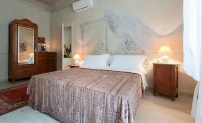 Letto o letti in una camera di San Lorenzo Apartments
