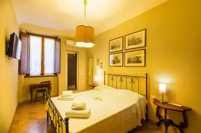 Letto o letti in una camera di Santa Maria Novella - Appartamento Piccolo Sogno