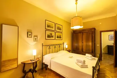 Letto o letti in una camera di Santa Maria Novella - Appartamento Piccolo Sogno