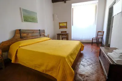 Letto o letti in una camera di B&B Bonsignori