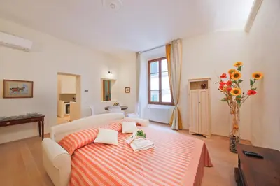 Letto o letti in una camera di Proconsolo Superior Suite