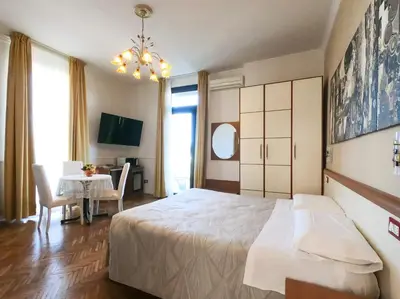 Letto o letti in una camera di Soggiorno Rubino