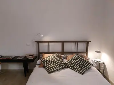 Letto o letti in una camera di La Casa di Greta