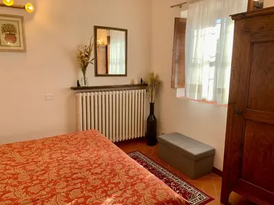 Letto o letti in una camera di Agriturismo Il Colle