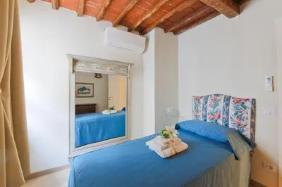 Letto o letti in una camera di Proconsolo Superior Apartment