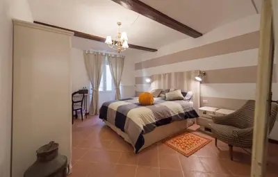 Letto o letti in una camera di La Trinuzia